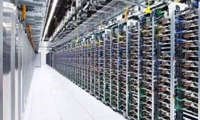 Modern cryptocurrency mining farm racks filled with ASIC miners